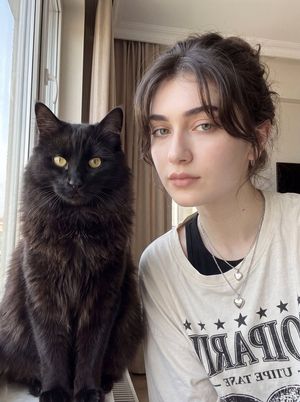 Woman with Fluffy Black Cat Portrait - 1